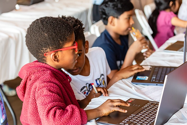 Students coding together