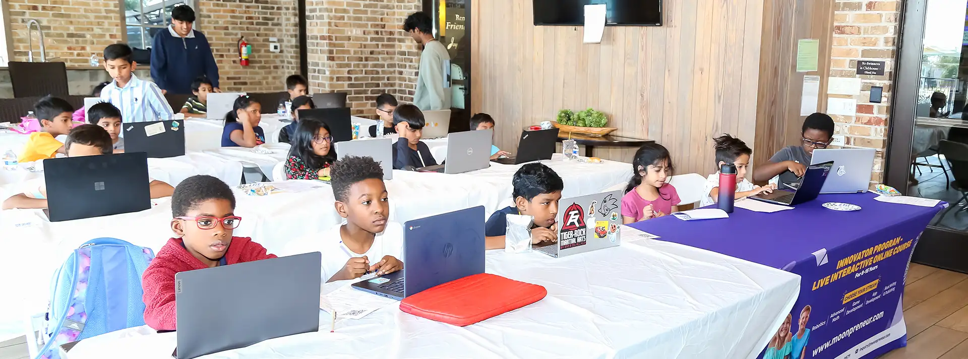 Students engaged in interactive tech workshop